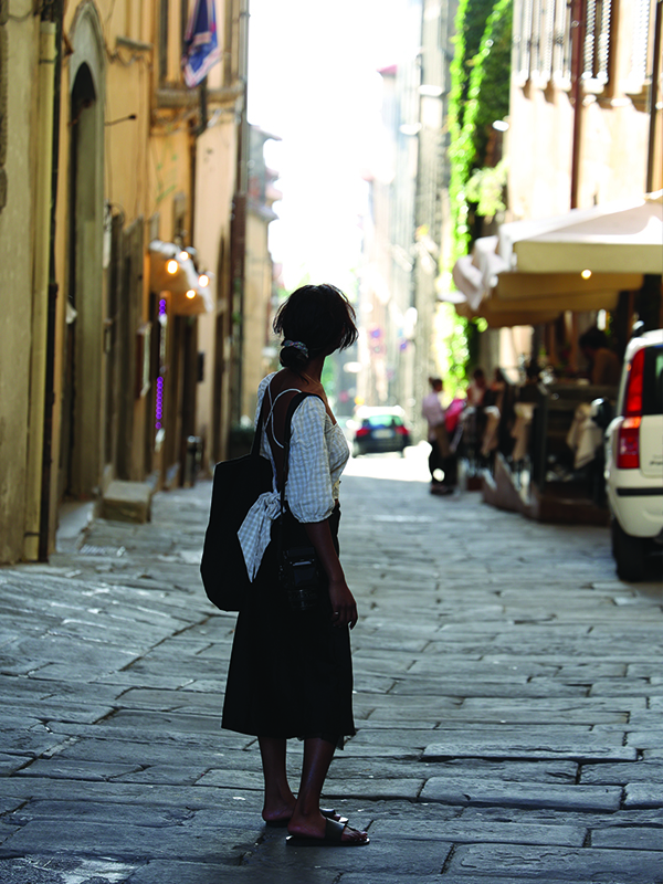 Creative School student exploring the streets of Cortona. 